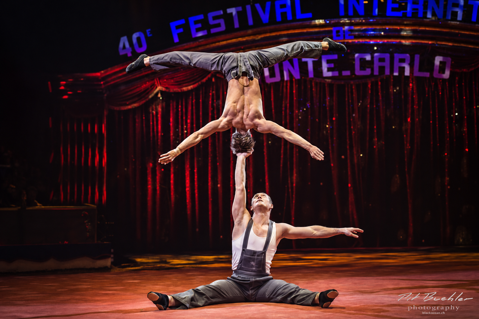 Duo Shcherbak Popov performing a one-arm balance at the 40th International Circus Festival of Monte-Carlo