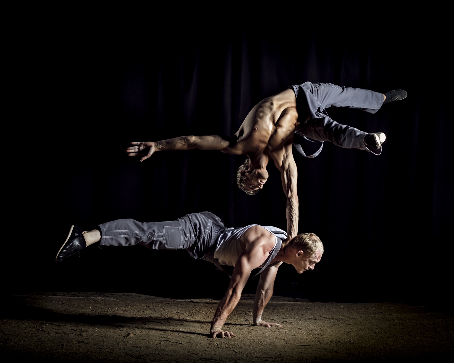 Duo Shcherbak Popov performing a hand-to-hand acrobatic balance