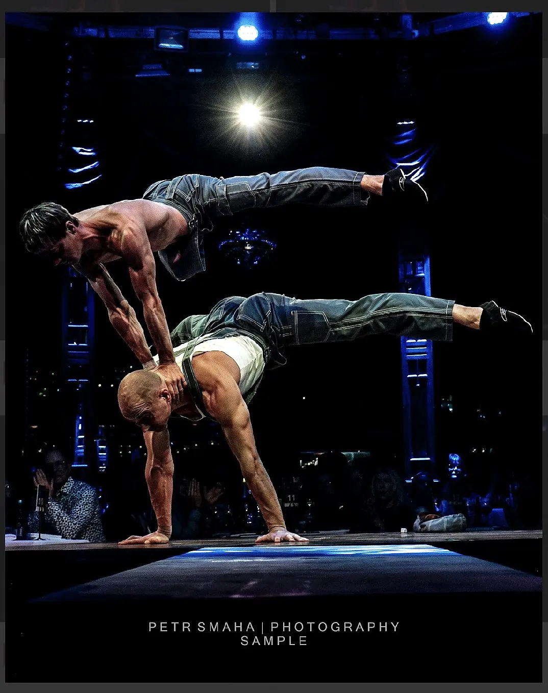 Double balance under blue stage lighting