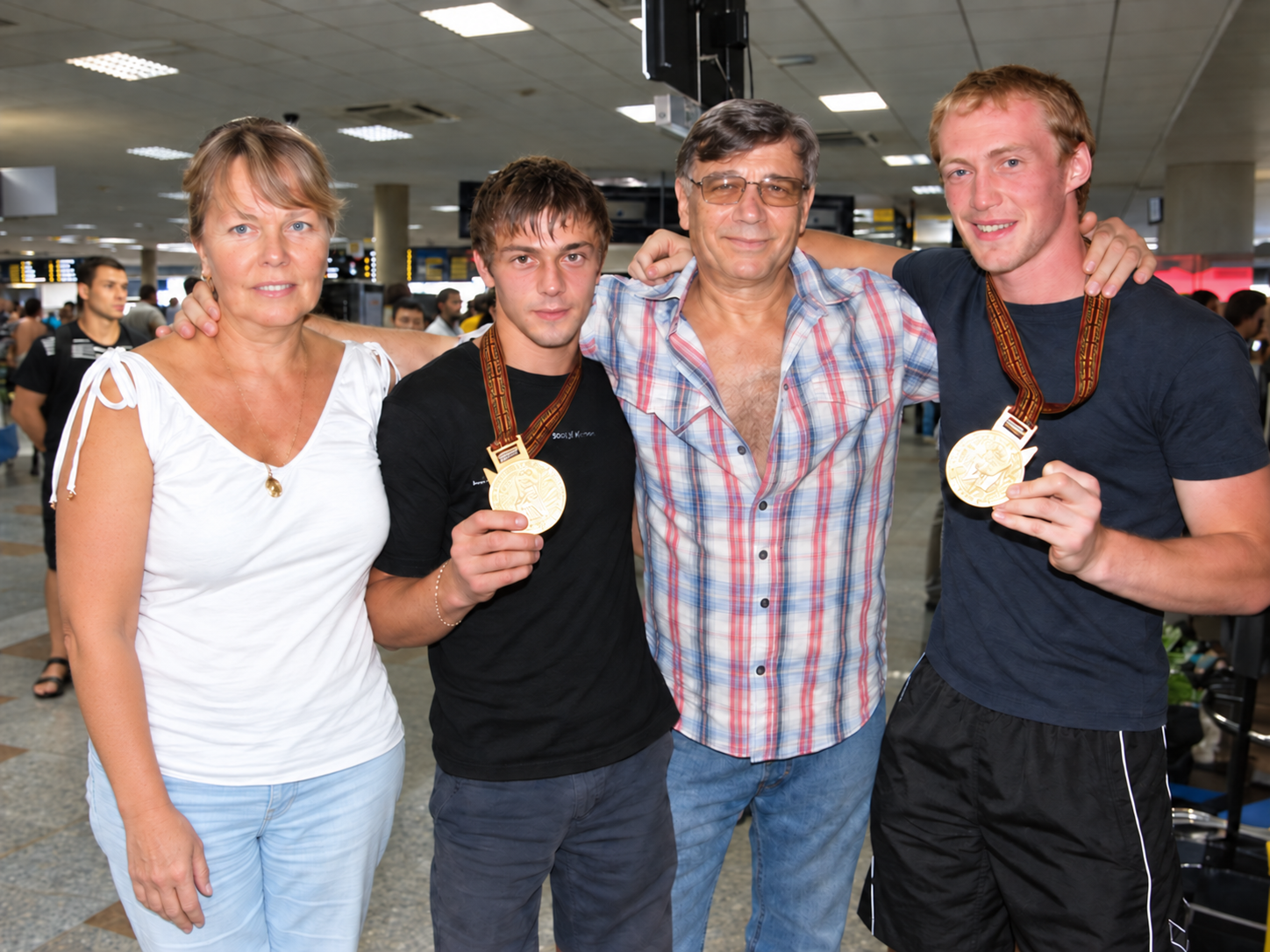 Duo Shcherbak Popov with their coaches Valentin Viktorovich Tretyakov and Lyudmila Anatolyevna Tretyakova